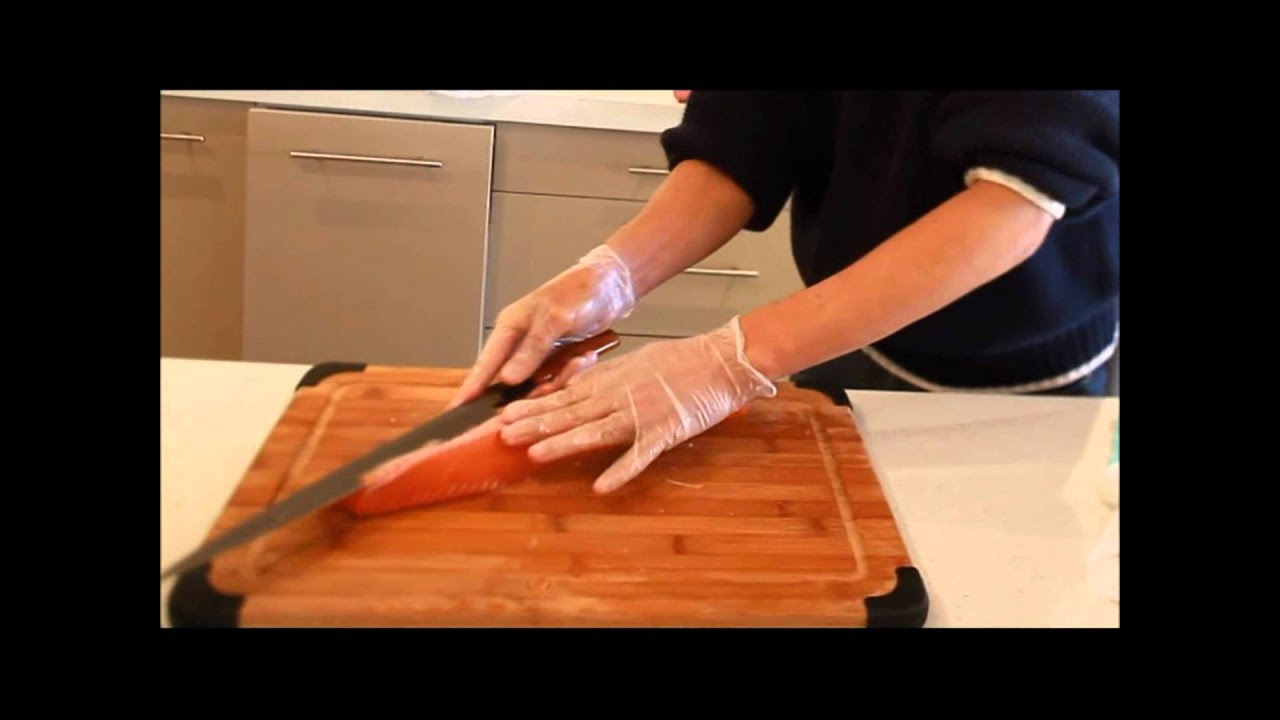 Professional Japanese Chef Preparing Sashimi