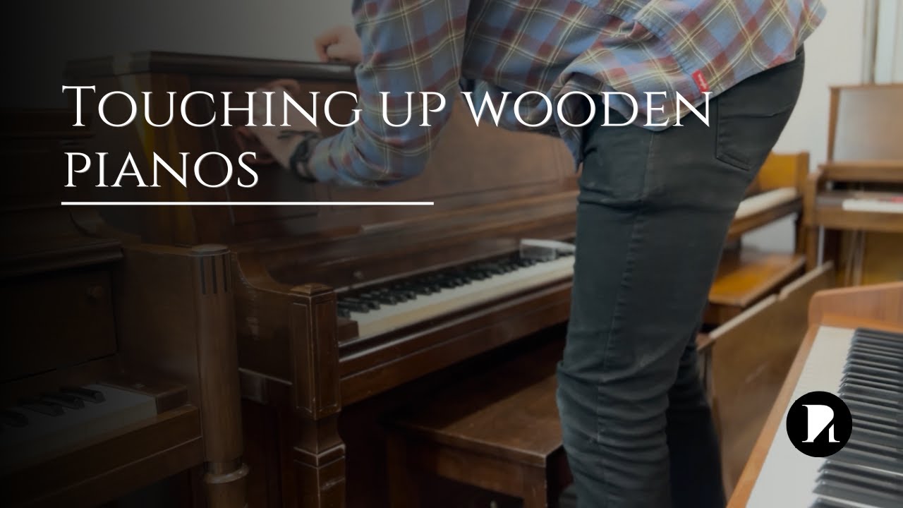 Touching up small scratches on a piano
