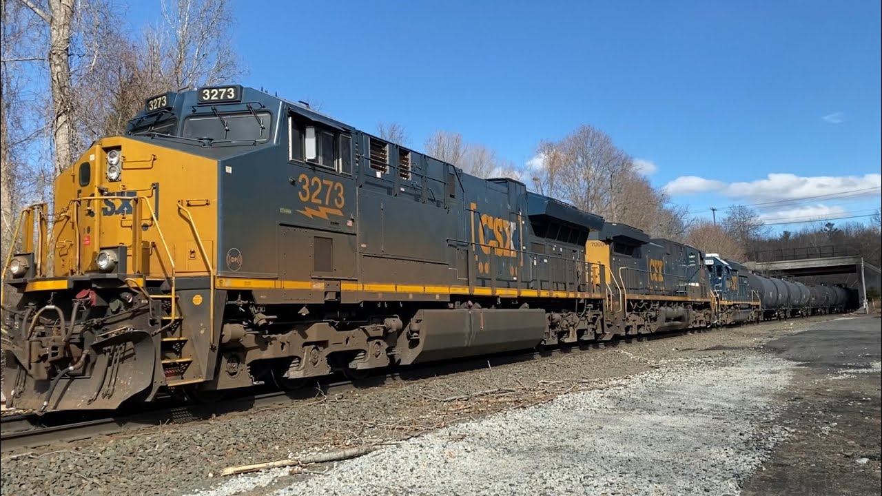 CSX M439 crawls uphill at CP57 with first AC44 rebuild #7000 and SD40 #8804