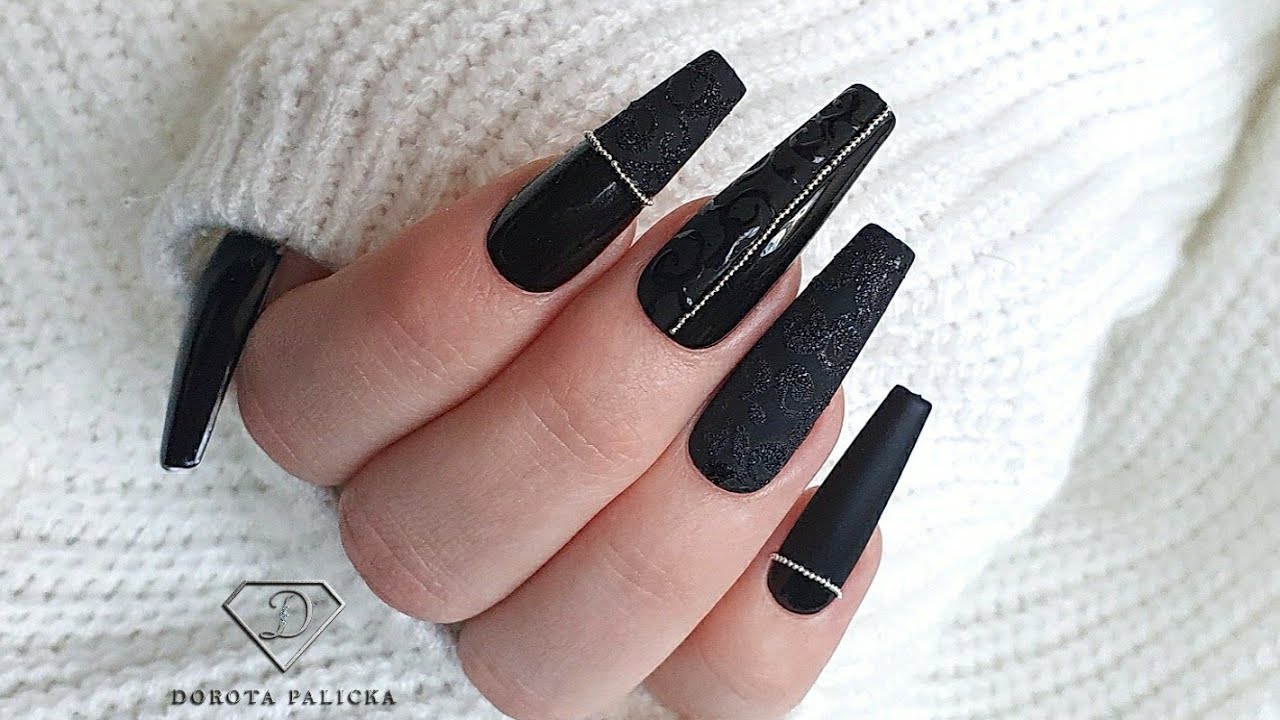 Black shiny and matte nail design with black sugar nail art.