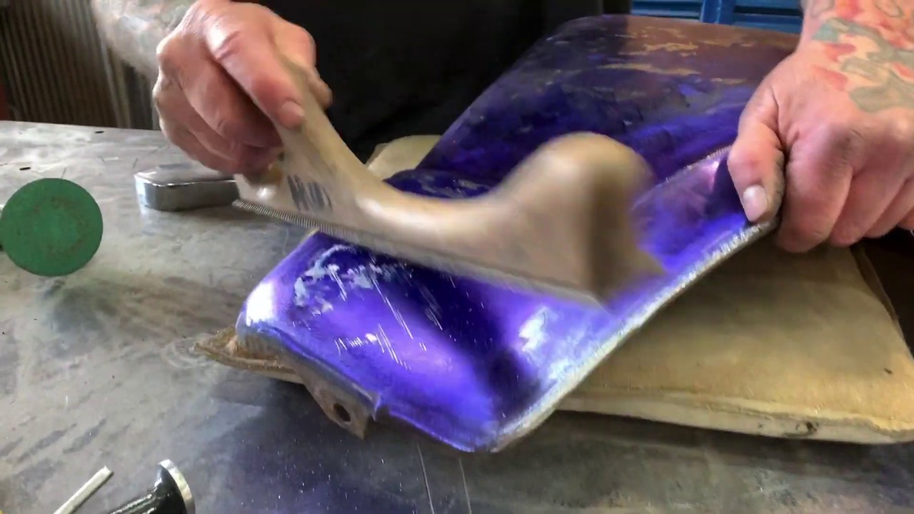 Metal shaping: fix a dented panel, hammer and dolly, a metal file and a beater bag