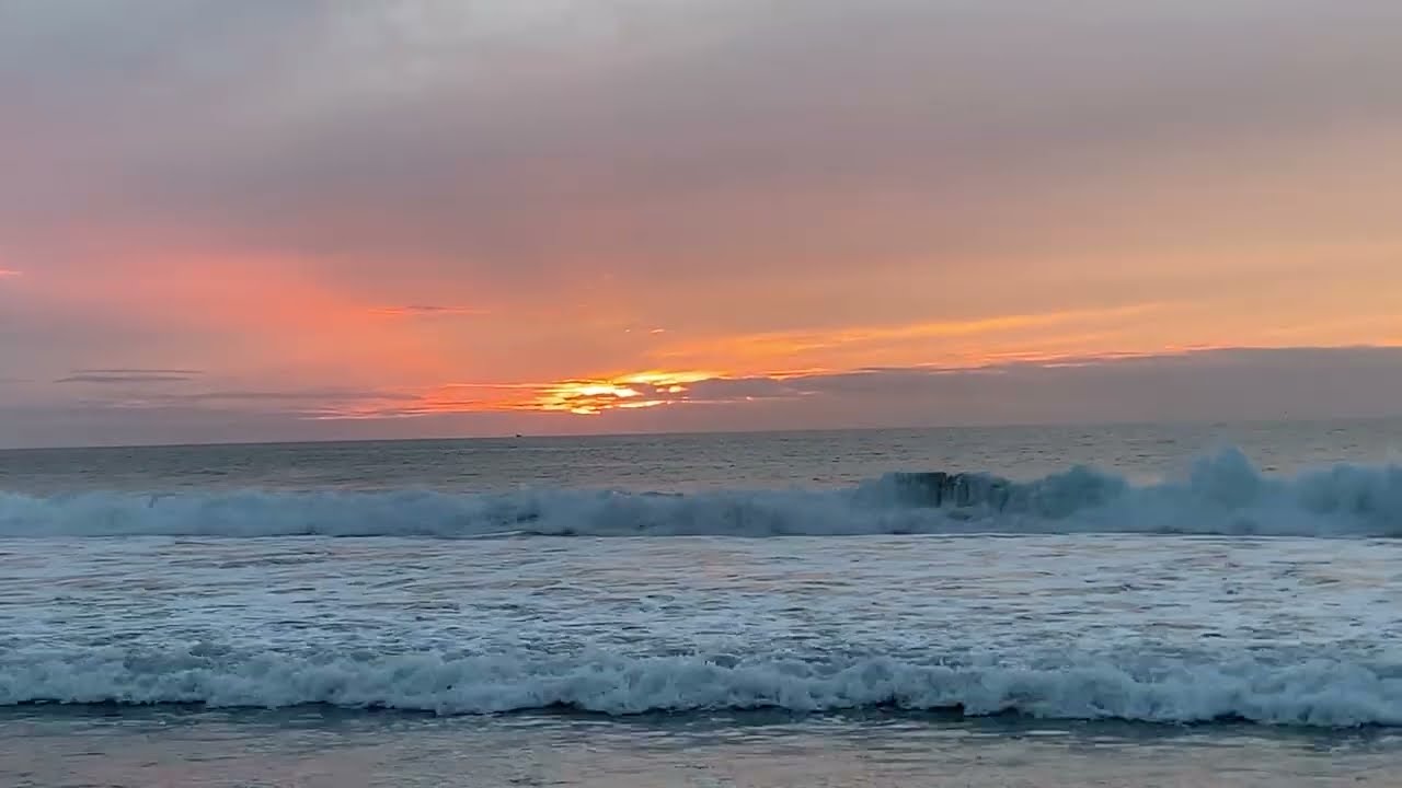 Play this beach sunset on your large screen TV