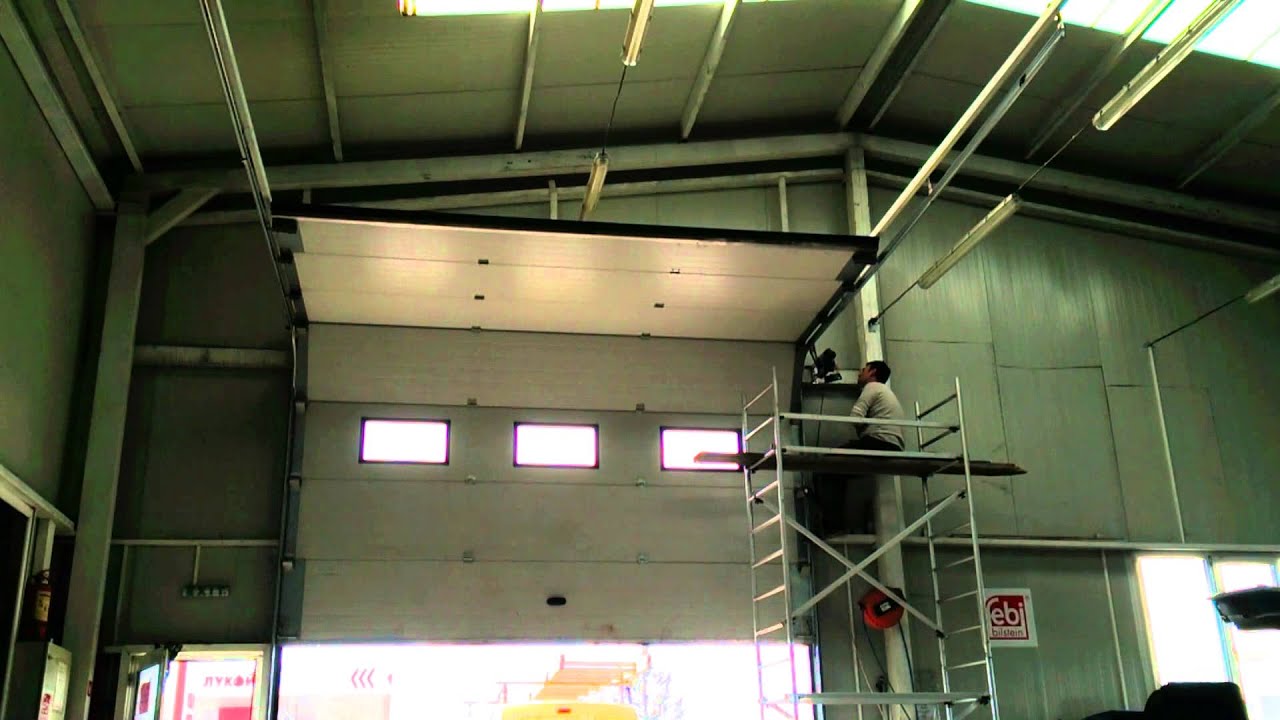 Гаражни врати Техноматика Експеримент с претоварване на страничен мотор за секционни врати