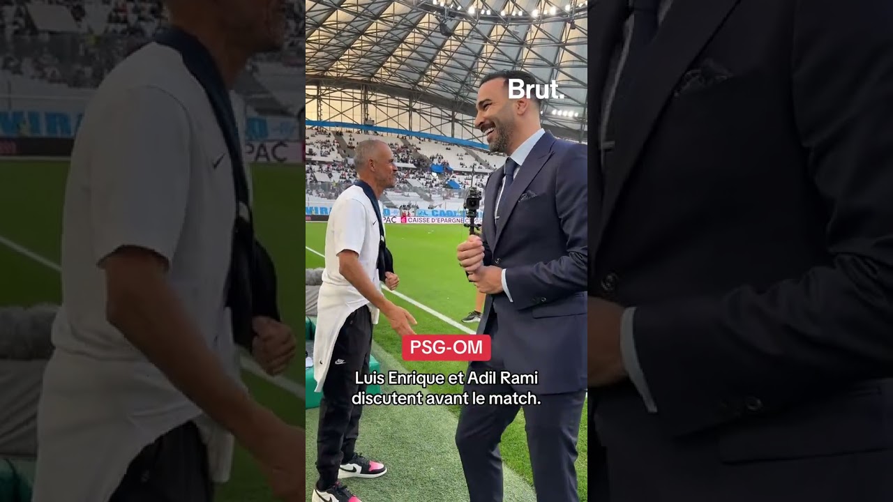 Luis Enrique et Adil Rami discutent sur la pelouse du V&eacute;lodrome avant le match OM-PSG