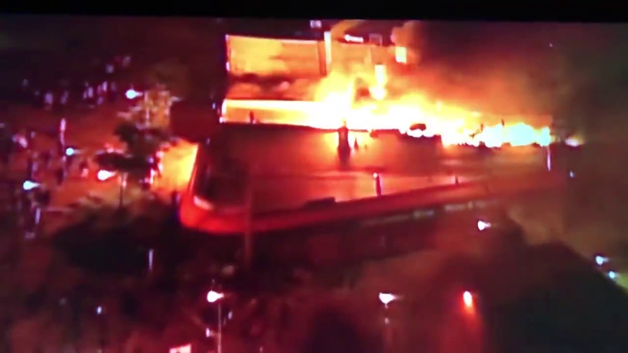 A Minneapolis police precinct was set on fire as tensions continued to escalate over the killing
