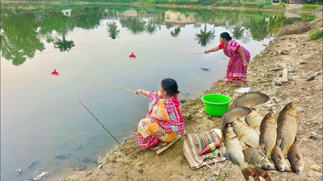 Fishing video || Two women are using different types of bait to catch fish from a pond 