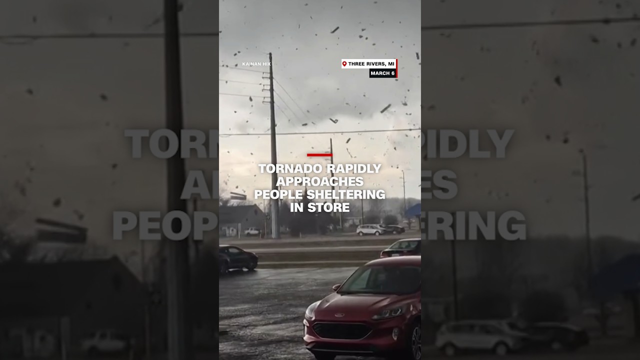 Tornado rapidly approaches people sheltering in store