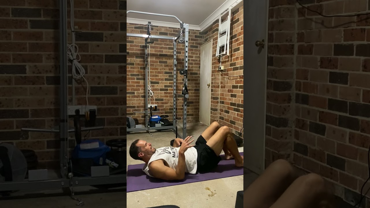 Half Hook Lying Leg Lift