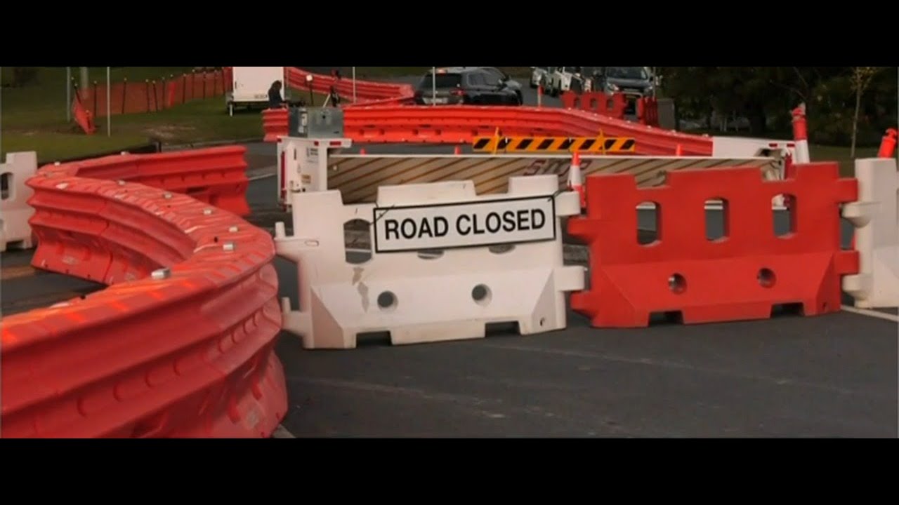 Concrete barriers stretching 500 metres to be removed as Qld hard borders lift