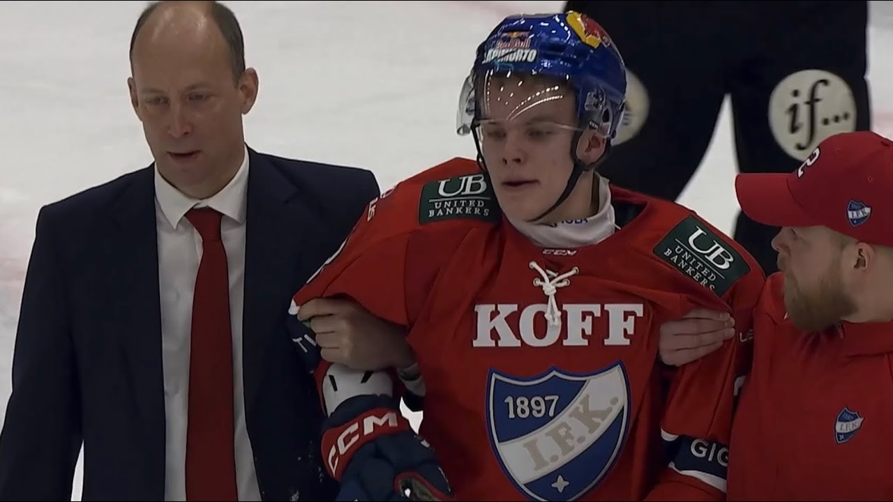 Kärppien Roni Hirvonen laukoo HIFK:n Aron Kiviharjua päähän - Kiviharju talutetaan koppiin
