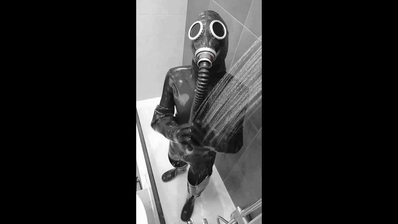 Taking a shower in full rubber gear