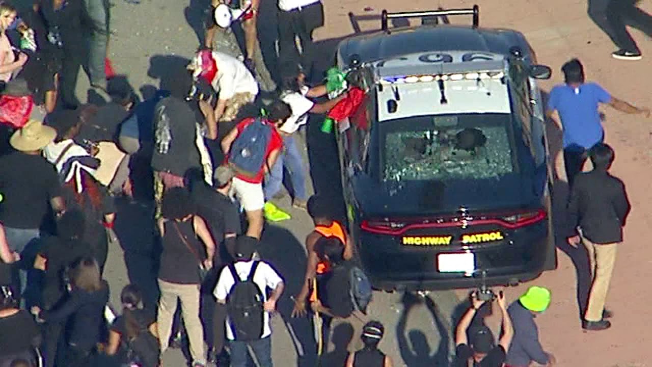 Black Lives Matter protesters smash window of CHP cruisers near downtown LA I ABC7