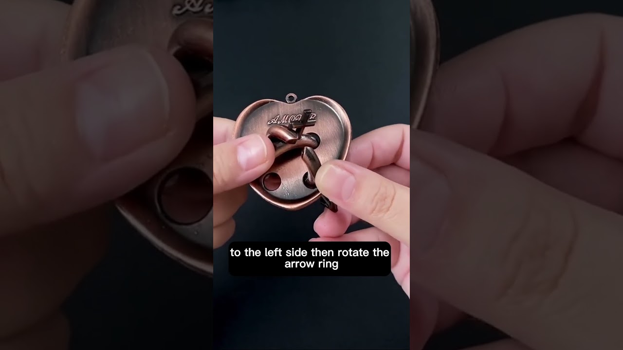 How to remove the two iron rings  into the heart shape puzzle / brain teaser 63 