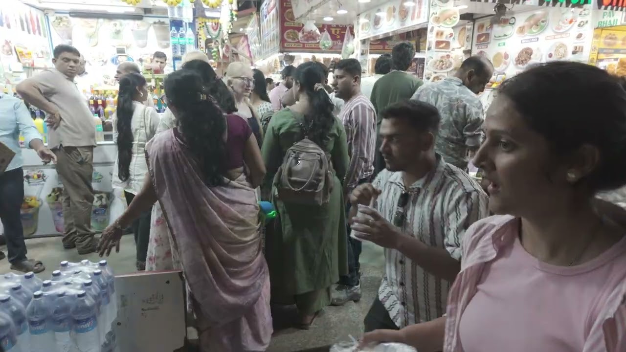 THOUSANDS GATHER NIGHTLY JUHU BEACH