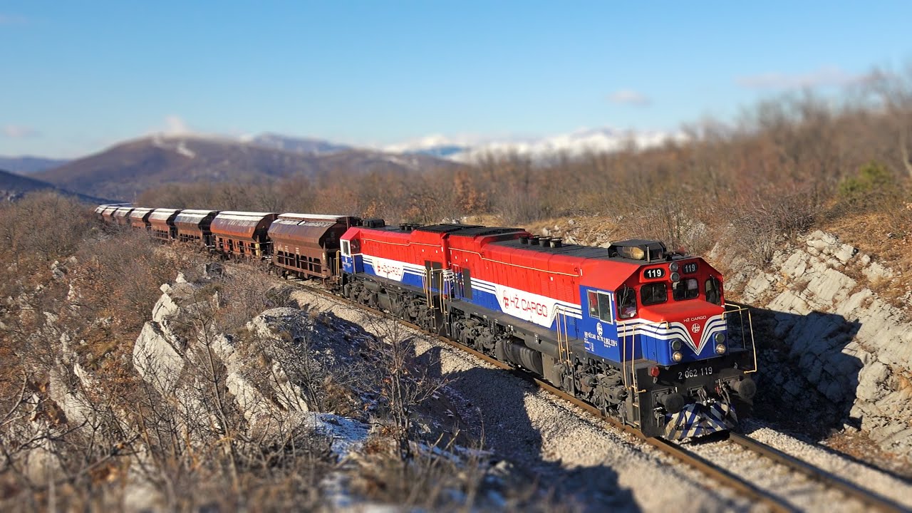 Modernized EMD G26 hauilng a train above Zrmanja, Croatia