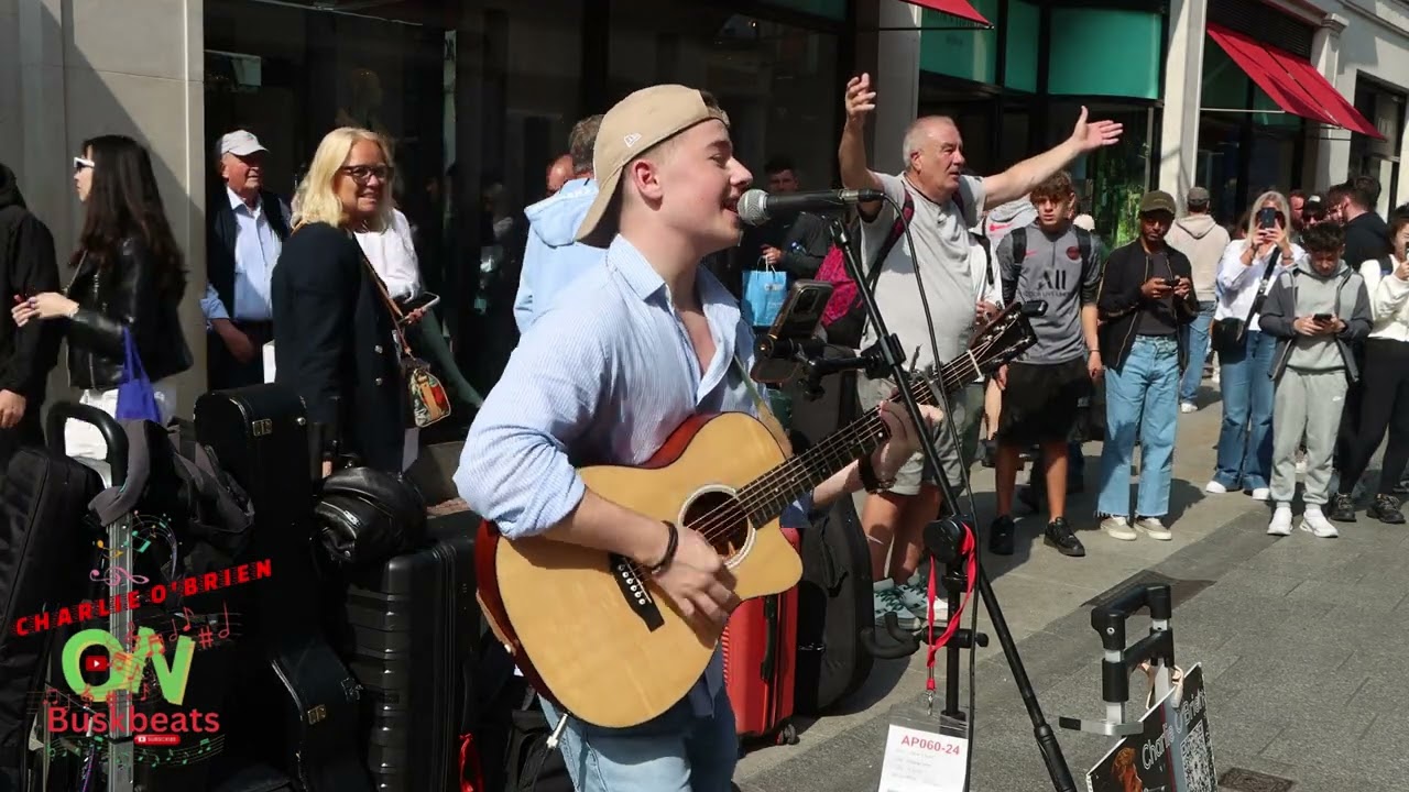 Charlie O'Brien and big Audience in the Sun sing Wake Me Up Song by Avicii Grafton Street Dublin