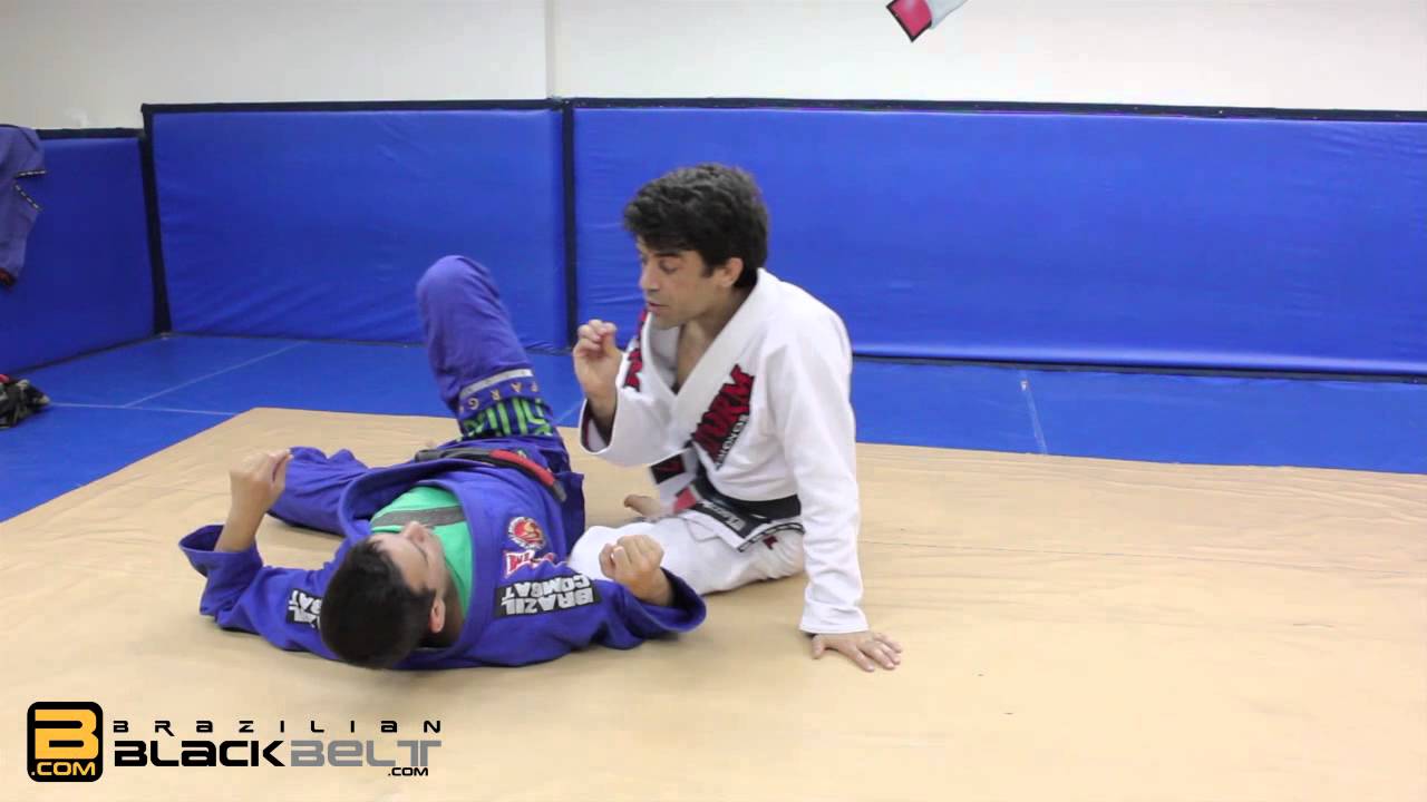 Sweep to pass from 50-50 guard || BrazilianBlackBelt.com
