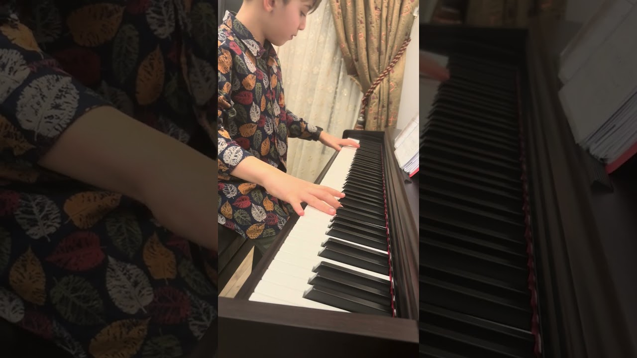 Close-up for Asturias Leyenda by Isase Albeniz (9 years old C.Barış playing the piece)