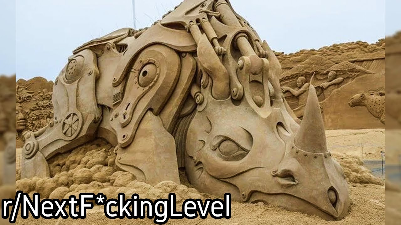 r/NextF*ckingLevel | A.. Mechanical Rhino Sand Sculpture??