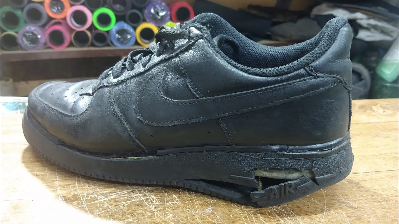 Troca de solados de tênis Nike. Tênis em couro.