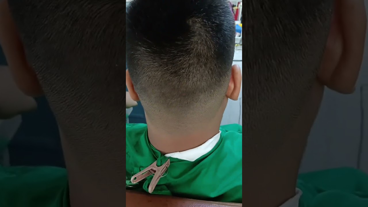 Buzz Cut - 5 guard on the top.                       