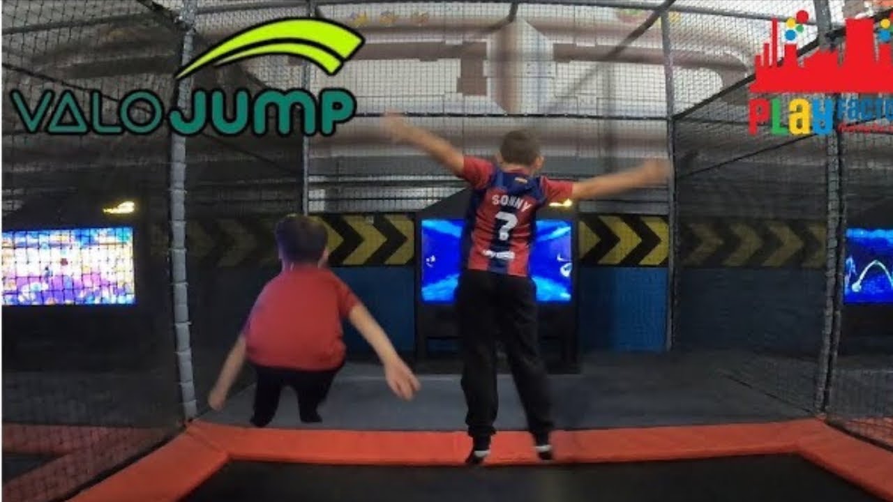 Playing ValoJump Interactive TRAMPOLINE Game - Playfactore Manchester
