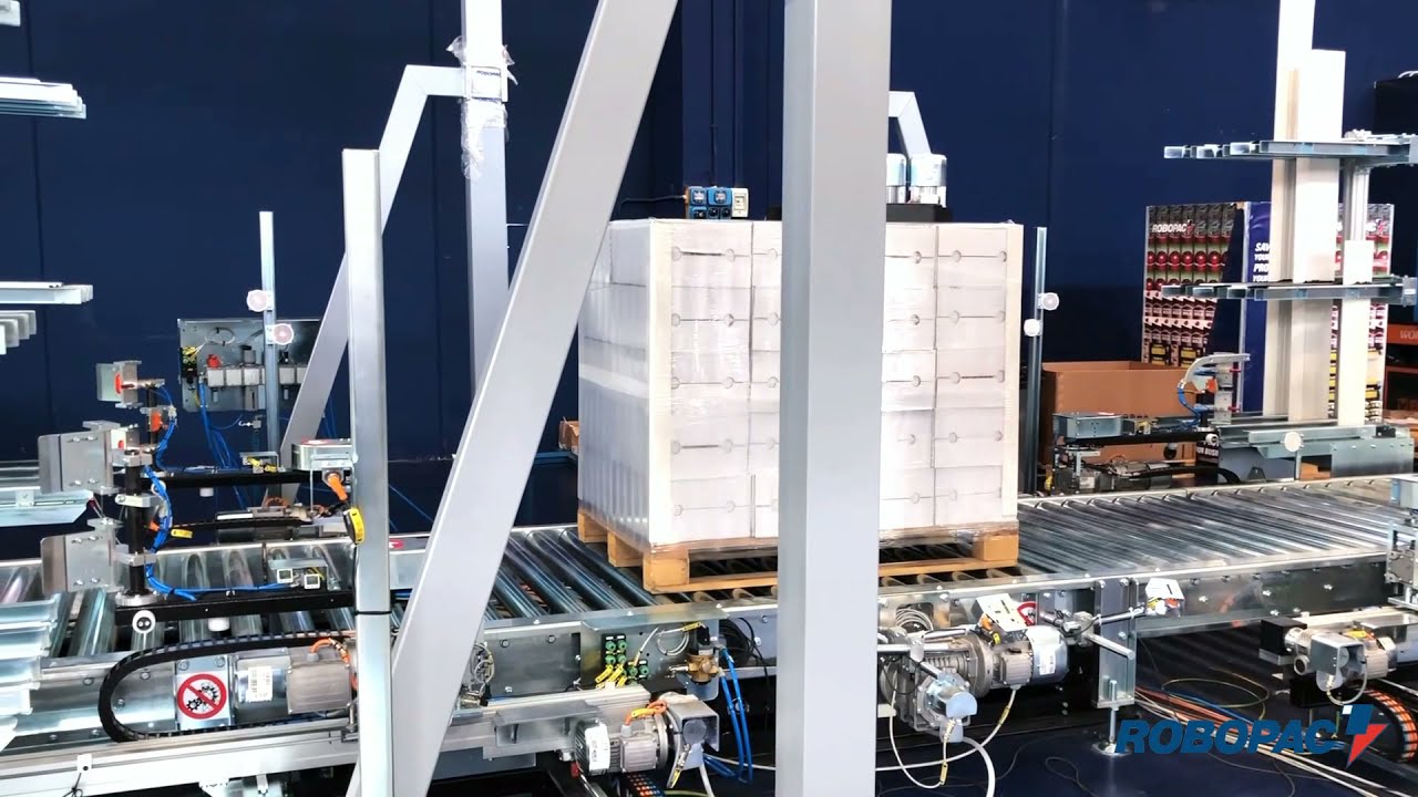 Corner applicator/ Applicator of 4 carton edgeboards on load's edges, Robopac