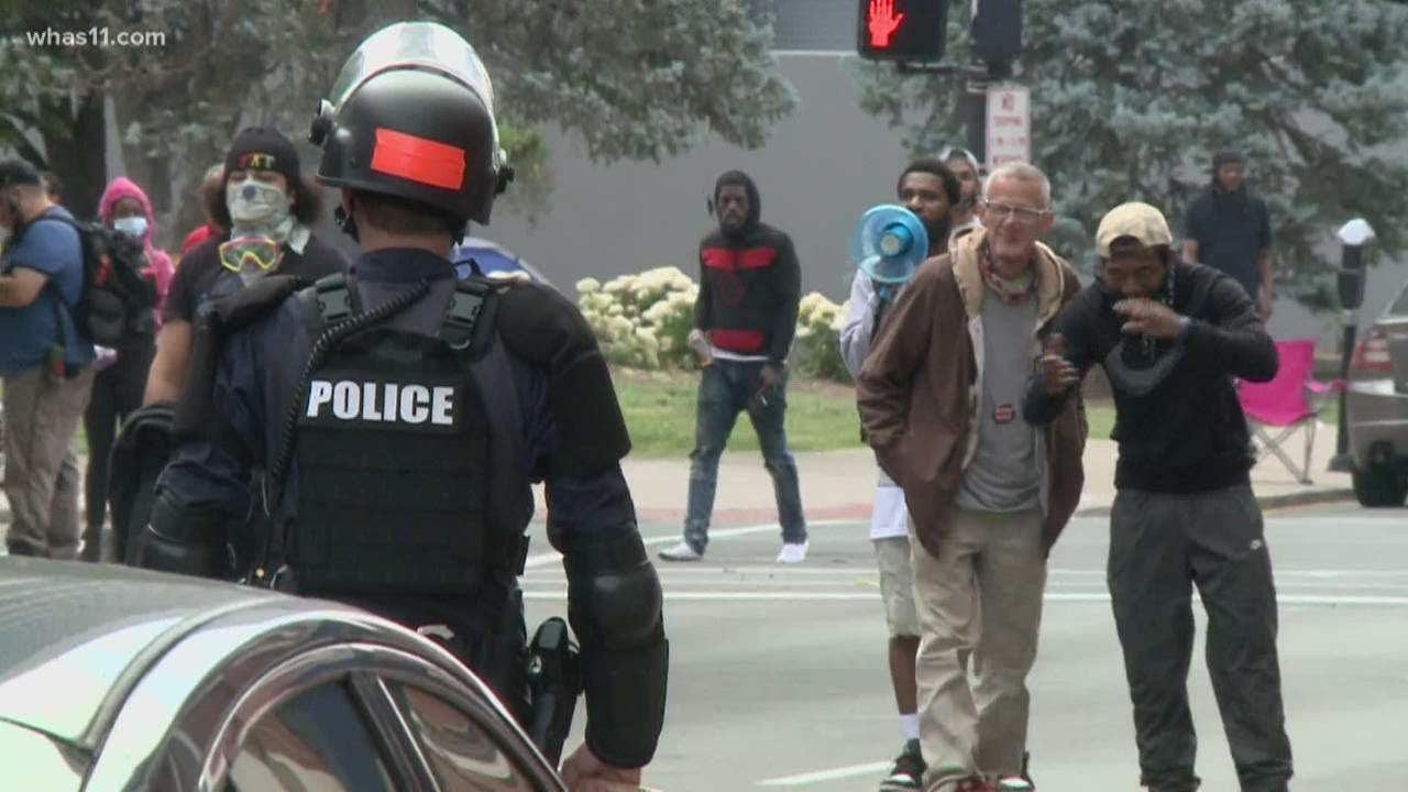 Crash Downtown between car and protesters
