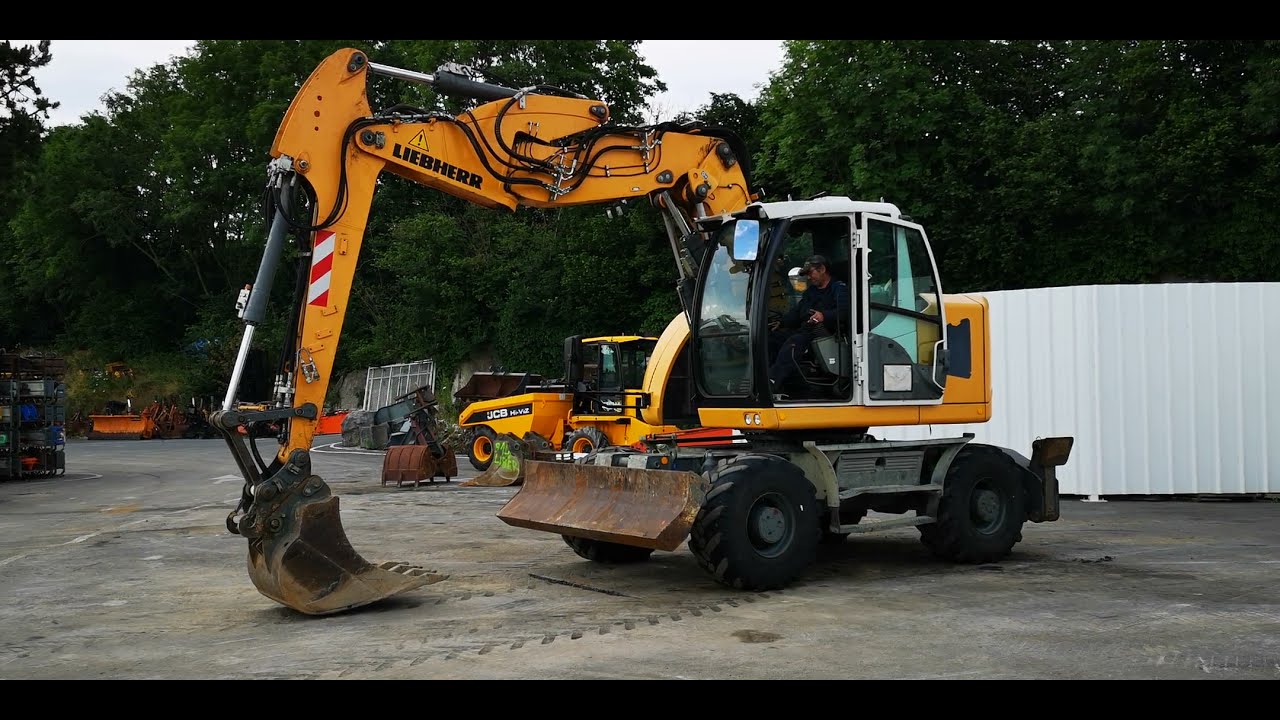 Pelle sur pneus Liebherr A 914 Compact