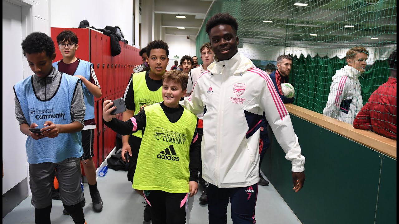 Arsenal players share some festive cheer in the local community