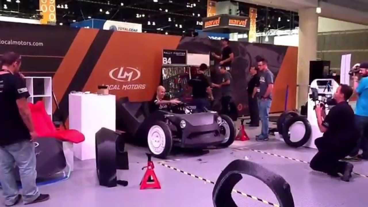 Chicago IMTS 2014, Strati-Local Motors 3D printed, Michele Anoe' tries the feeling of his car