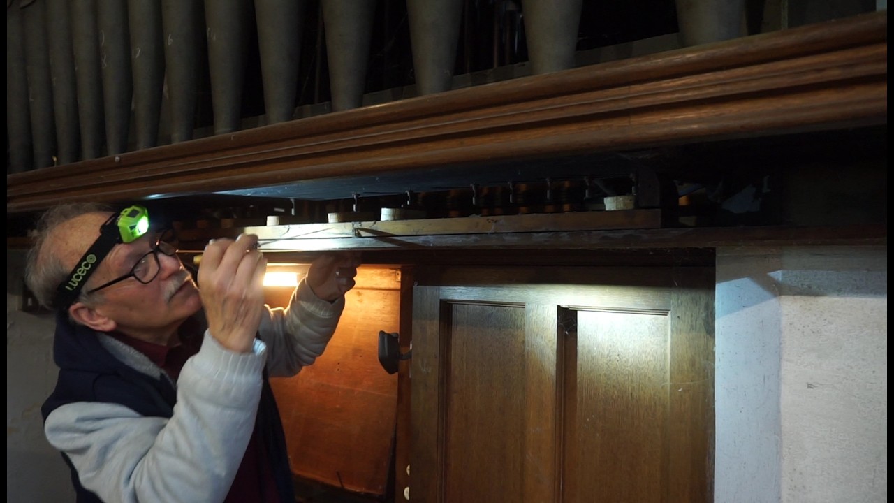 Replacing worn out leather motors on a pipe organ.