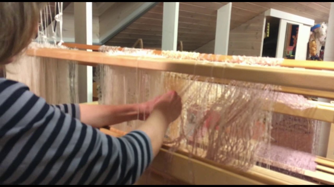 Getting ready to weave on a Toika Computer Loom