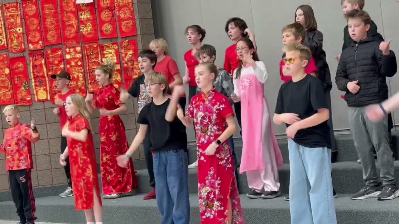 Ashley in Pink Ao Dai Singing Happy New Year at Eastlake | 6th Grade Chinese Class Performance