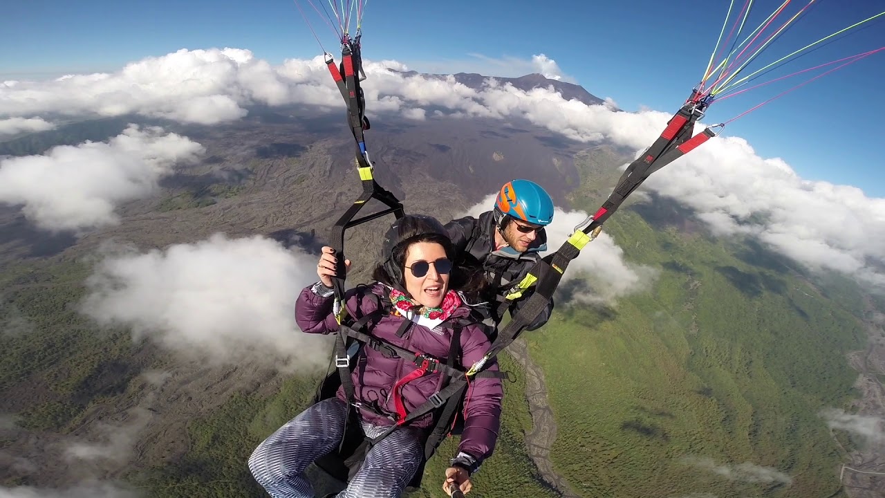 Paragliding off Volcano Mt Etna in Sicily.