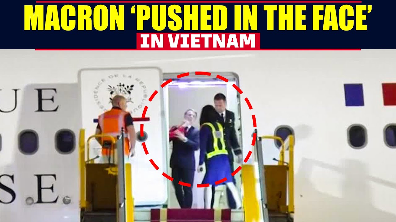MOMENT: French President Macron's face gets pushed away by hand in Vietnam | France | Hanoi