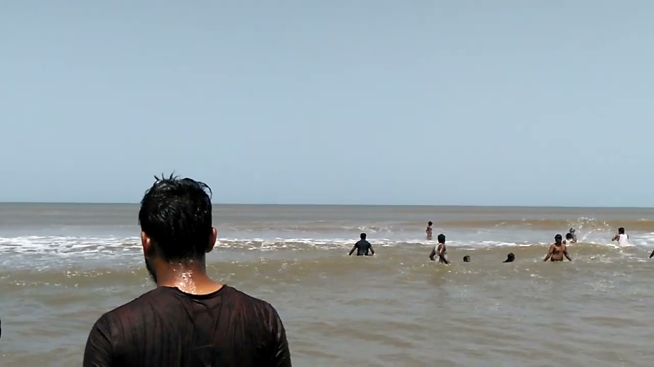 Beach/ people enjoying at a Andhra Pradesh beach/ famous beaches of Andhra Pradesh