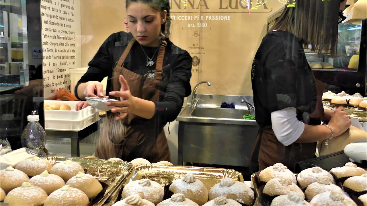Italy Street Food. 'Tette delle Monache' Tasty Creamy Sweets. 'Artigiano in Fiera', Milano
