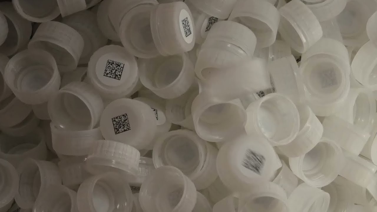 Pre-serialization of PET caps on cap production. Предсериализация ПЭТ-колпачков на их производстве.