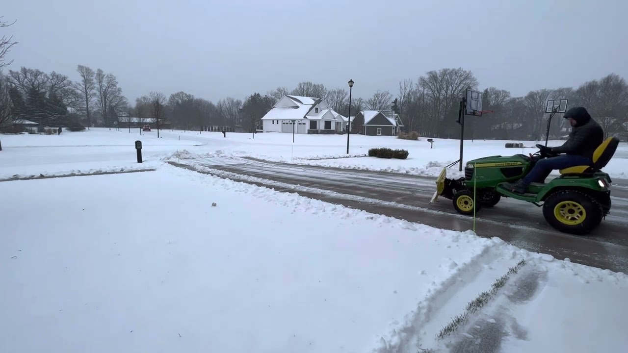John Deere X738 Plowing Snow