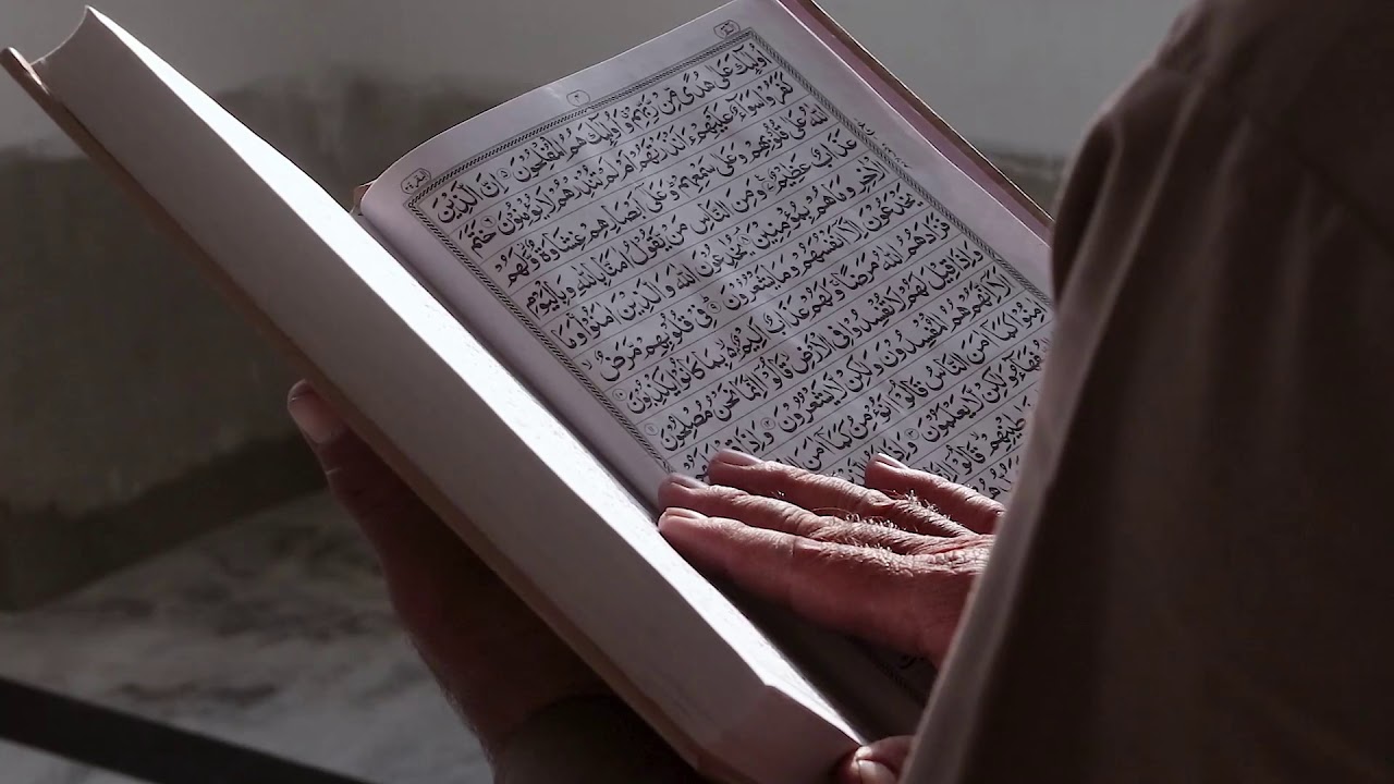 Islamic Background Video - Copyright &copy; Free &ndash; Muslim Man Reading Holy Quran