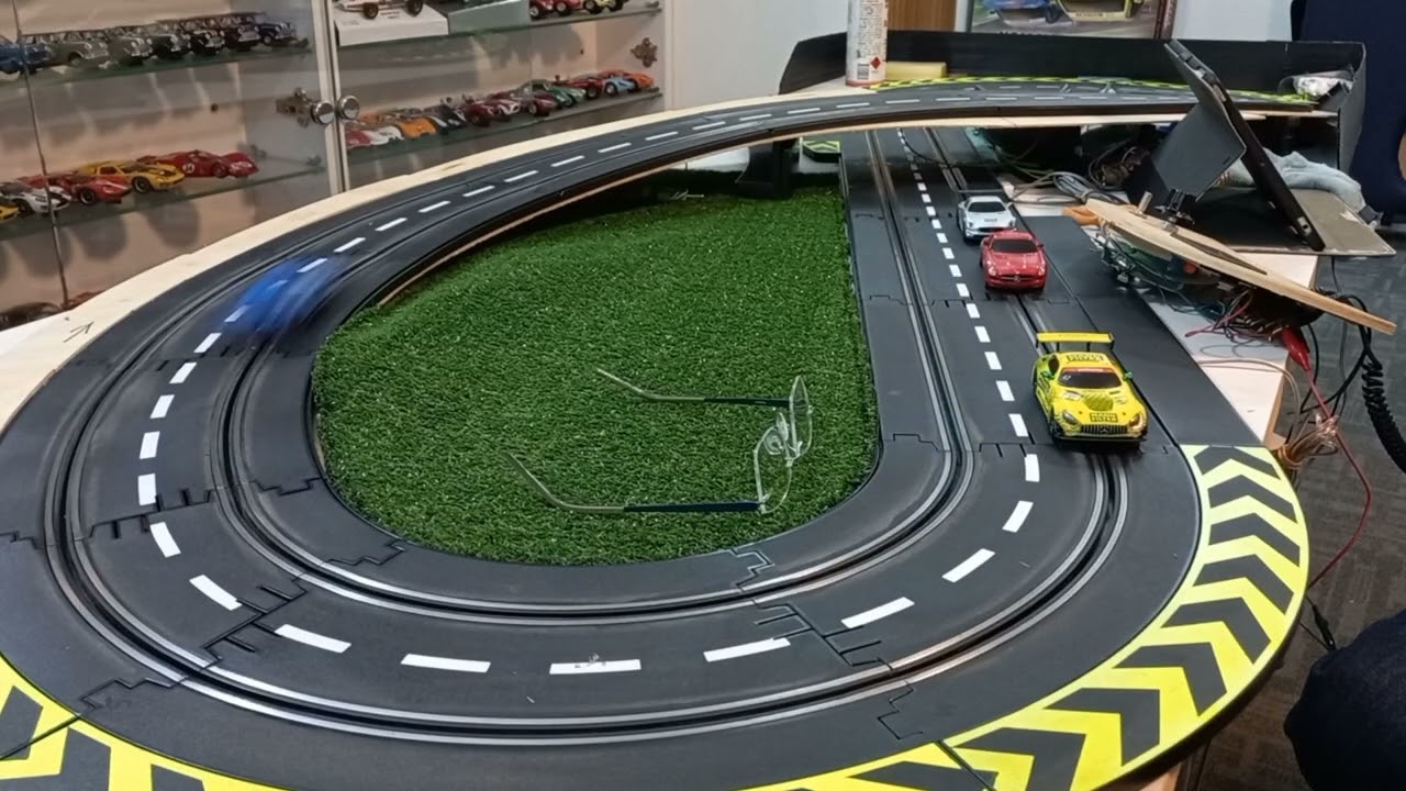 Power sliding a Carrera GO!!! 1/43 Mercedes SLS GT3 Slot Car at high speed