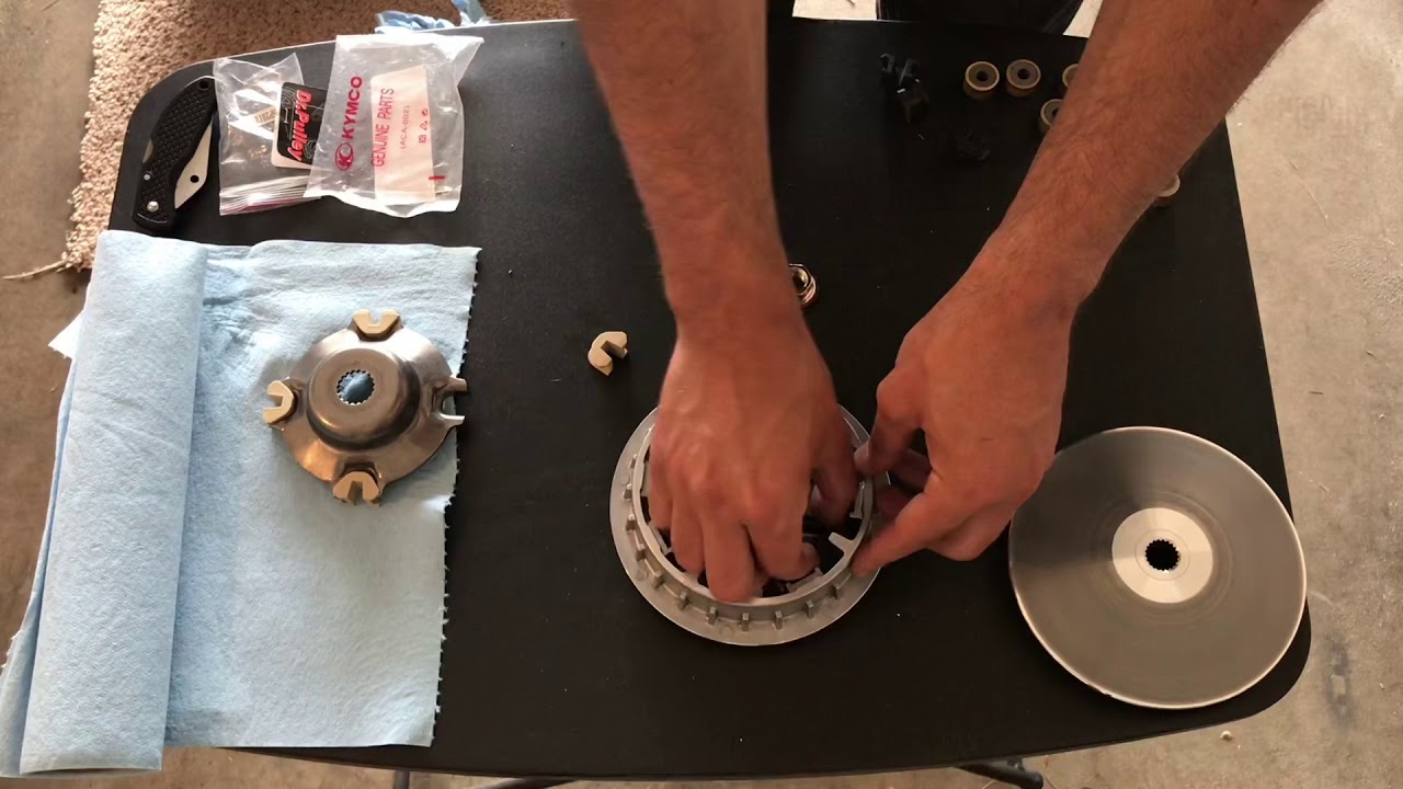 Kymco Downtown CVT transmission maintenance - (belt, rollers, sliders and clutch inspection)