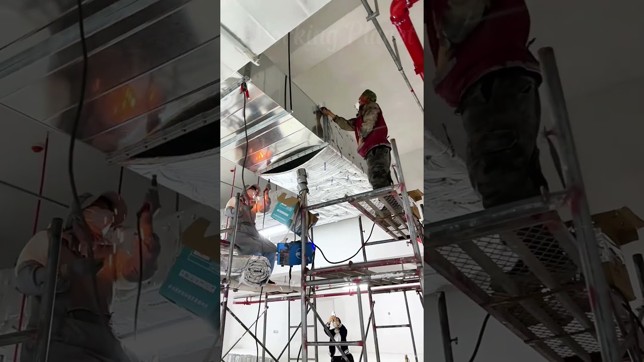 Workers Install Industrial Fire Rated Wraps 🛠️
