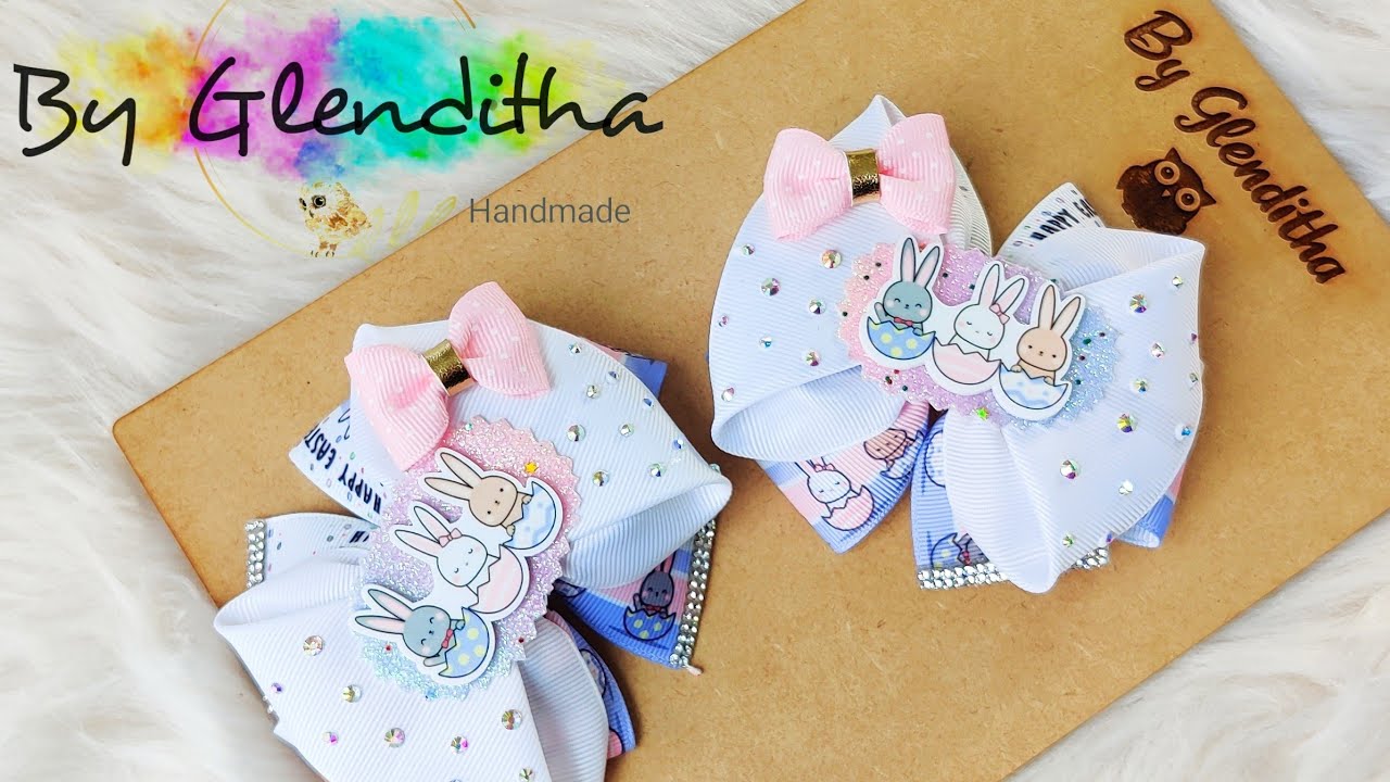 par de moñitos easter💜🌈