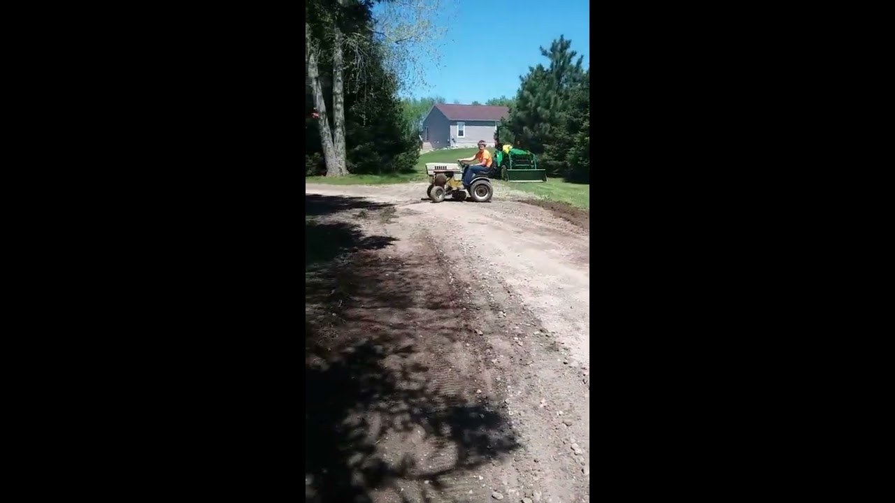 Moving dirt with the Sears ST16's belly blade