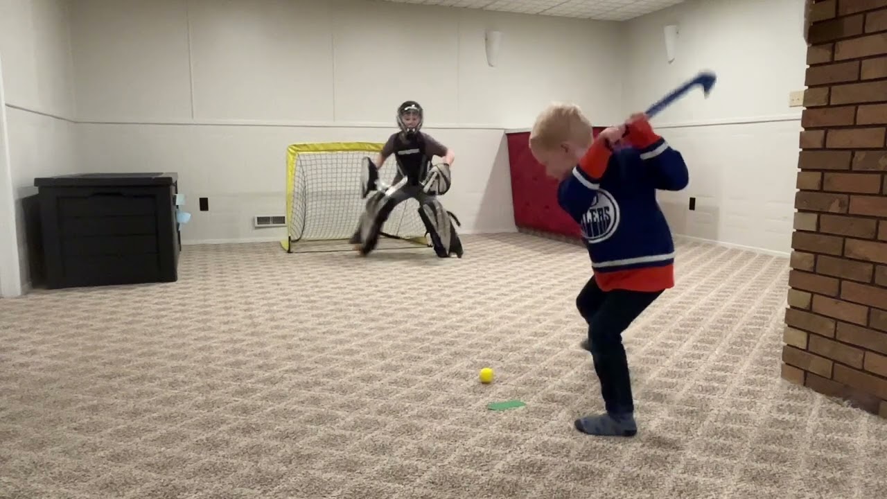 Amazing knee hockey mini stick goals from a 4 year old!
