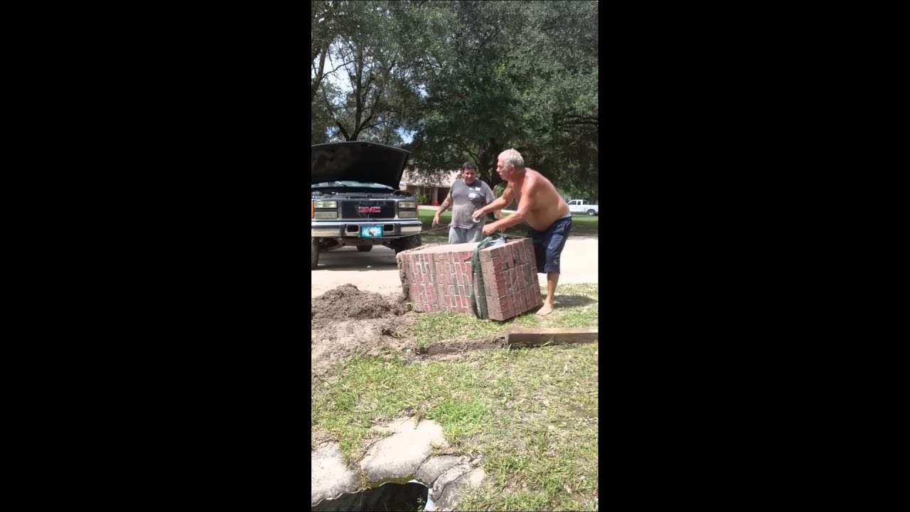 Brick mailbox standing back up after being hit