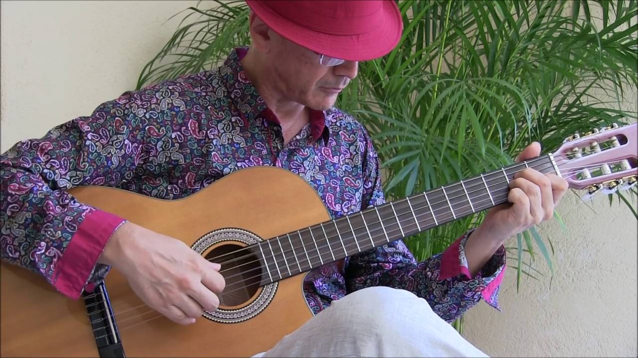 CARLOS URIBE ON GUITAR: La Casa del Sol Naciente