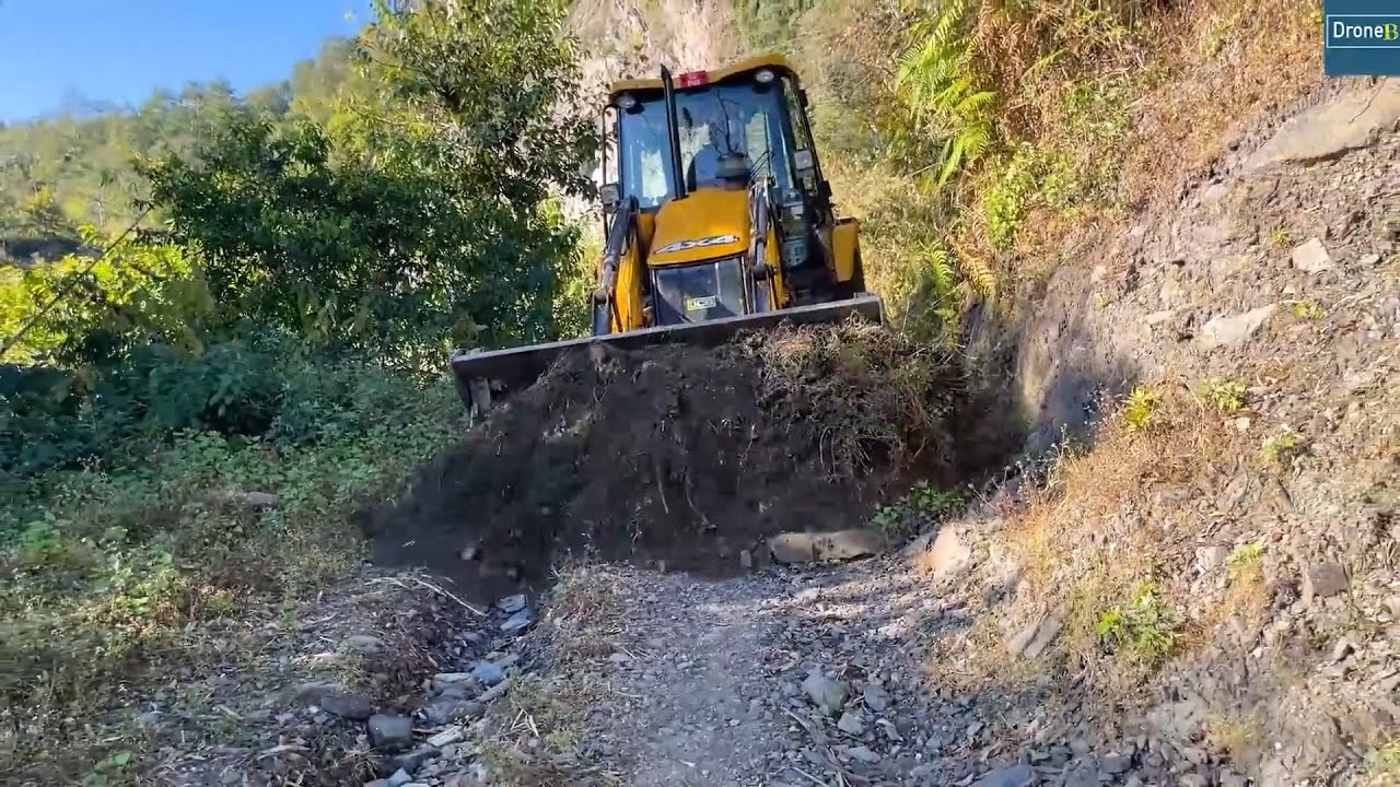 Monsoon Rain Made Rutted Cattle Path Transformed to Drivable Road
